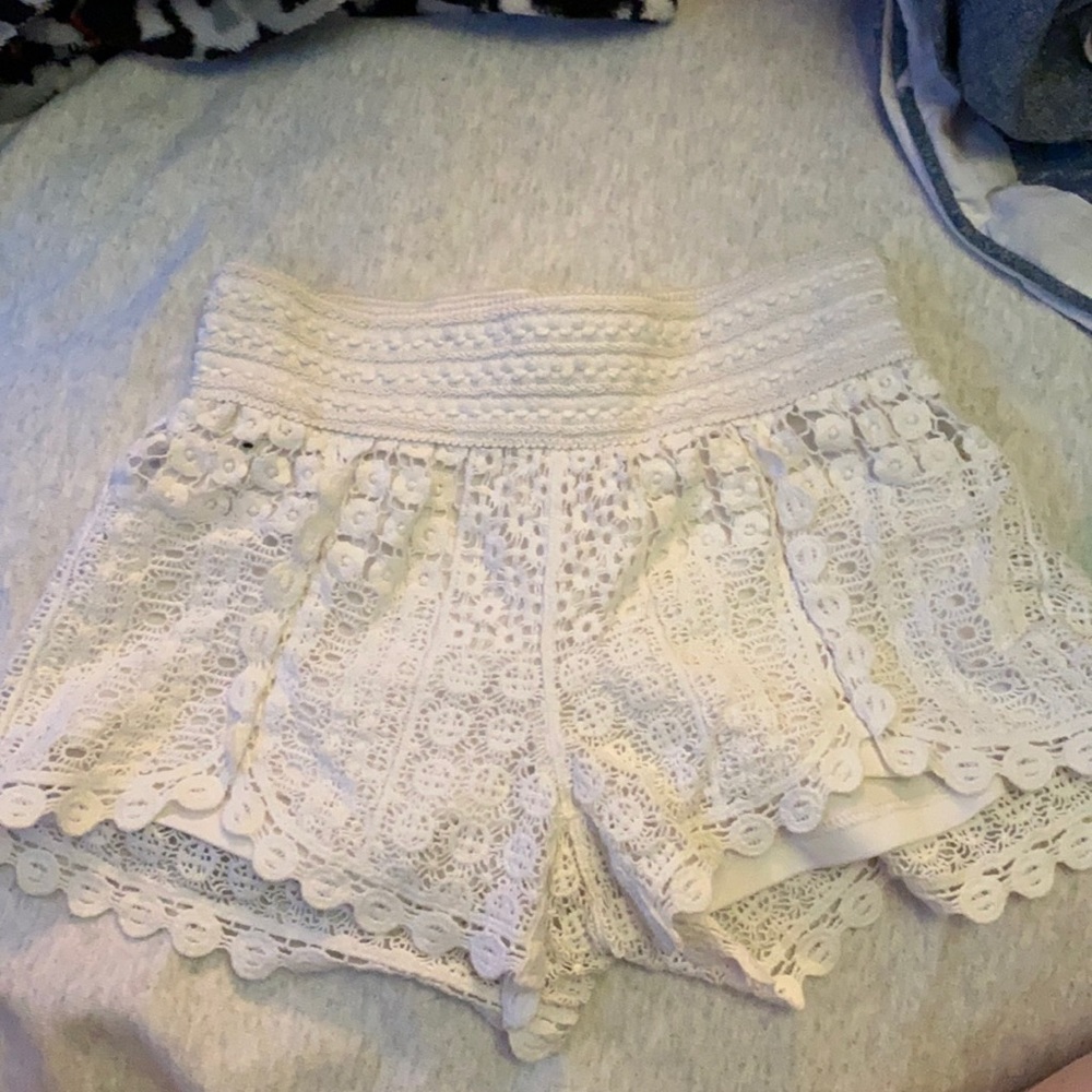 white mesh pattern shorts